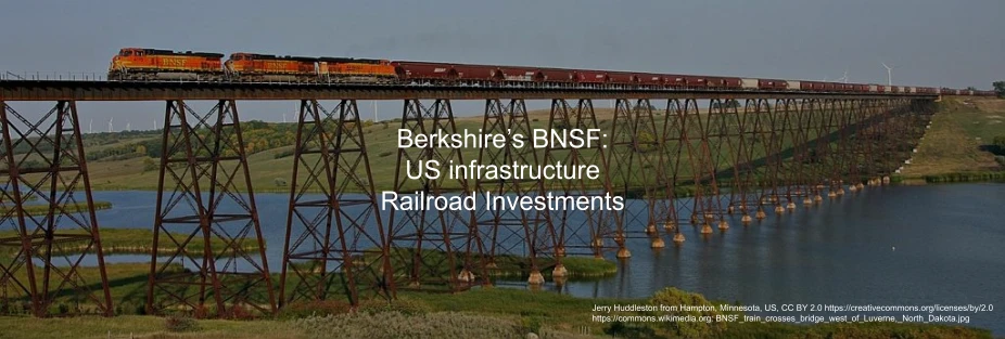 BNSF train on long bridge with US infrastructure investment headline